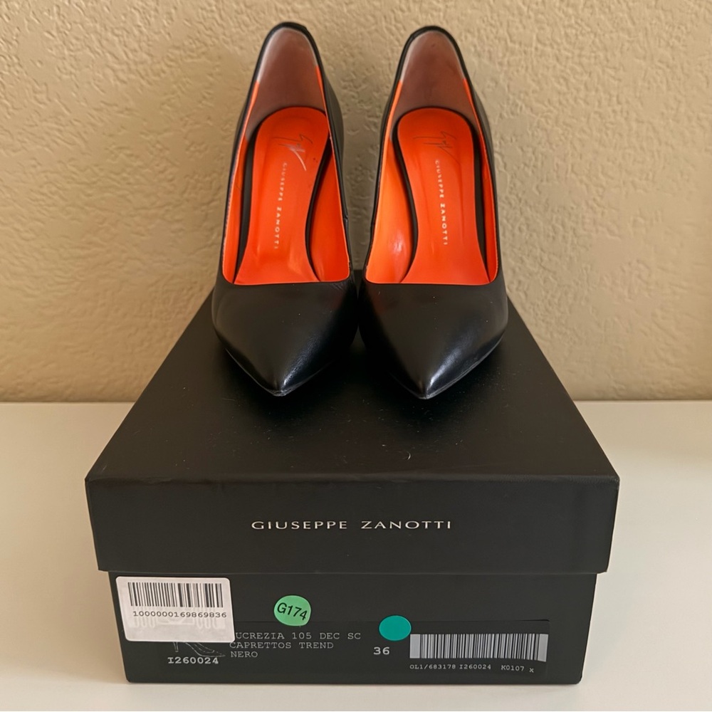 Giuseppe Zanotti Black Heels with Vibrant Orange Interior